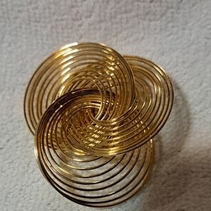 Elegant Gold Spiral Brooch
